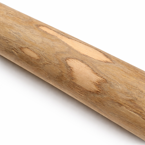 Close-up of splinter-free coffee wood dog chew showing natural wood grain texture